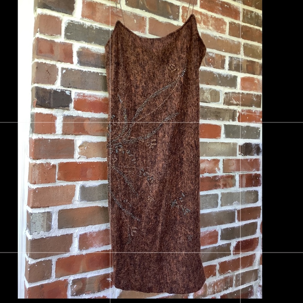 Kay Unger form fitting dress with beaded flowers and straps. Mohair texture